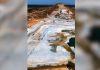 Pedreira no sul do TO impressiona por lago e áreas de extração de calcário vistas do alto; VÍDEO